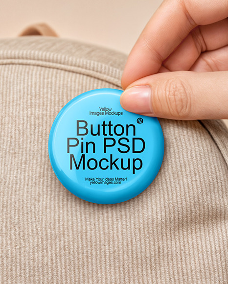 Hand Putting a Button Pin on a Backpack Mockup