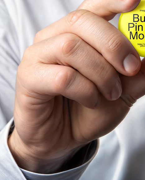 A Man with a Tie Holding a Button Pin Mockup