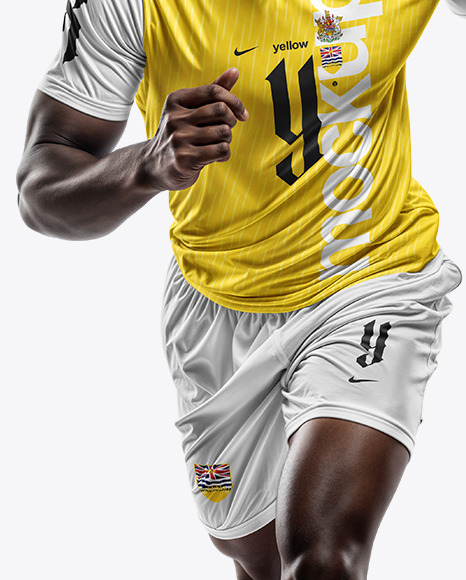 A Black Man Wearing Crew Neck Soccer Jersey and Shorts Mockup