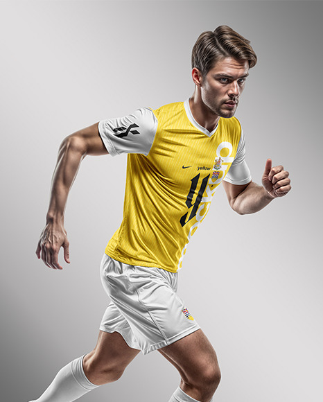 A Running Soccer Player Wearing a V-Neck Jersey and Shorts Mockup