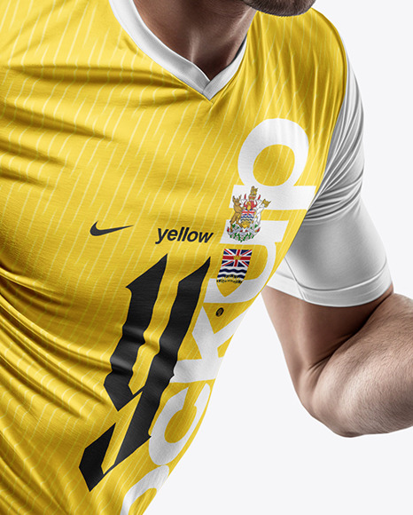 A Running Soccer Player Wearing a V-Neck Jersey and Shorts Mockup