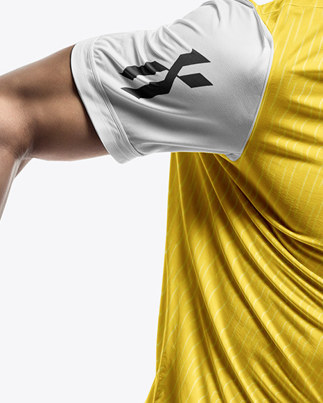 A Running Soccer Player Wearing a V-Neck Jersey and Shorts Mockup