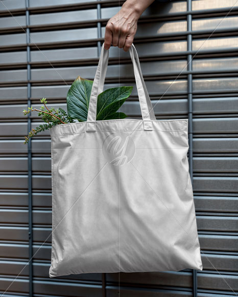 Hand Holding a Shopper Bag Mockup