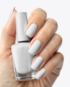 Nail Polish in a Woman's Hand with Manicure Mockup