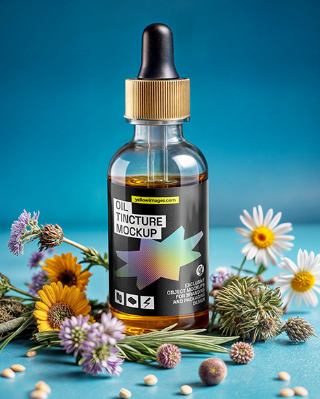 Oil Tincture Dropper Bottle with Herbs and Blue Background Mockup