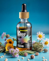 Oil Tincture Dropper Bottle with Herbs and Blue Background Mockup