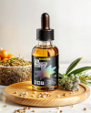 Oil Tincture Dropper Bottle on a Wooden Plate with Herbs Mockup