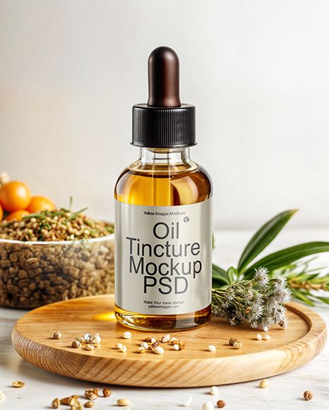Oil Tincture Dropper Bottle on a Wooden Plate with Herbs Mockup