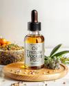 Oil Tincture Dropper Bottle on a Wooden Plate with Herbs Mockup