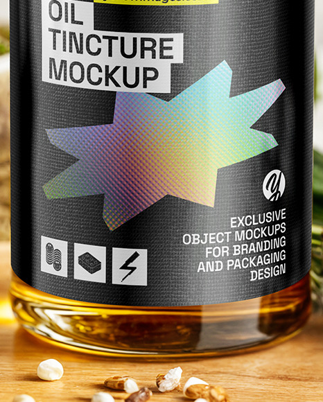 Oil Tincture Dropper Bottle on a Wooden Plate with Herbs Mockup