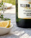 Green Glass Champagne Bottle on a Tablecloth Mockup