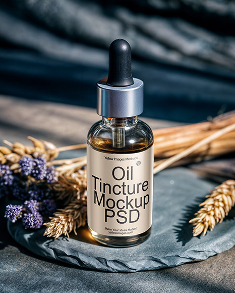 Oil Tincture Dropper Bottle on a Stone Plate with Herbs Mockup