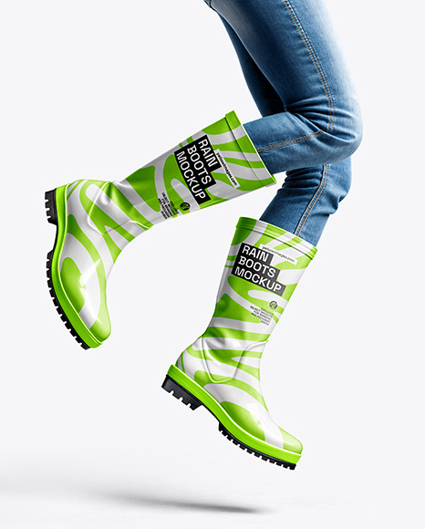 Rain Boots on Jumping Women's Legs with Jeans Mock
