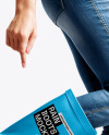 Rain Boots on Jumping Women's Legs with Jeans Mock