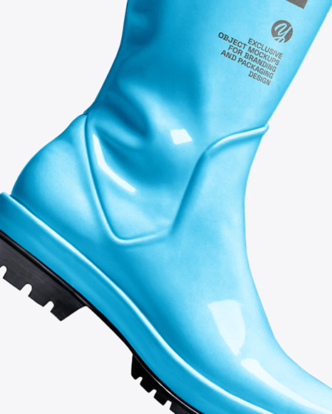 Rain Boots on Jumping Women's Legs with Jeans Mock