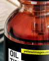 Ruby Oil Tincture Dropper Bottle with Feathers on Fabric Mockup