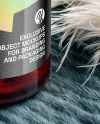 Ruby Oil Tincture Dropper Bottle with Feathers on Fabric Mockup