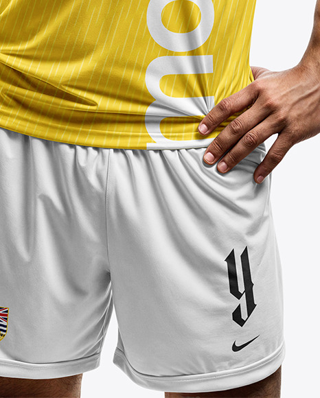 A Latino Man Wearing a Raglan Soccer Jersey and Shorts Mockup