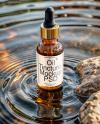 Amber Oil Tincture Dropper Bottle on Water Surface Mockup