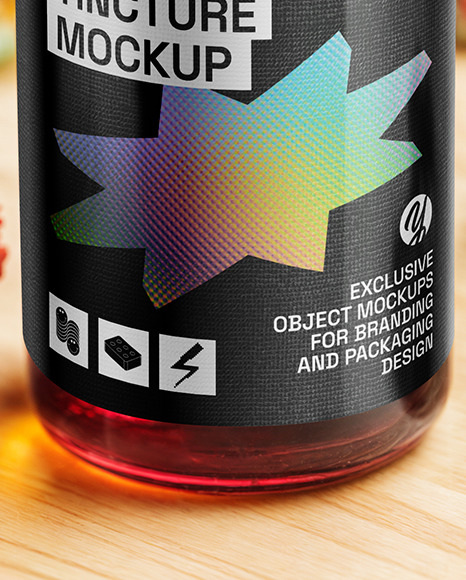 Red Oil Tincture Dropper Bottle with Flowers on Wooden Board Mockup