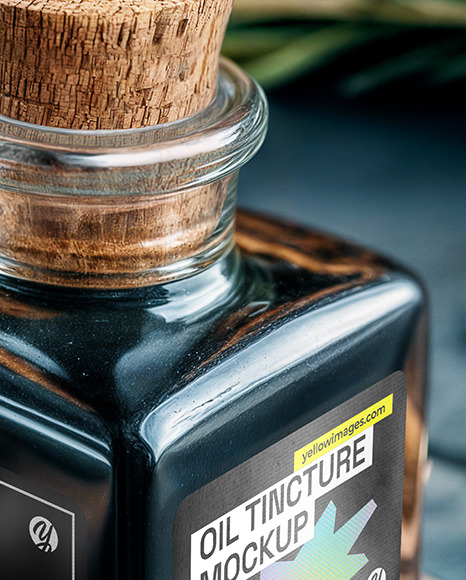 Dark Oil Tincture Square Bottle on a Wooden Board with Herbs Mockup
