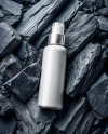Spray Bottle On Black Stones Mockup