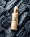 Spray Bottle On Black Stones Mockup