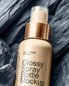 Spray Bottle On Black Stones Mockup