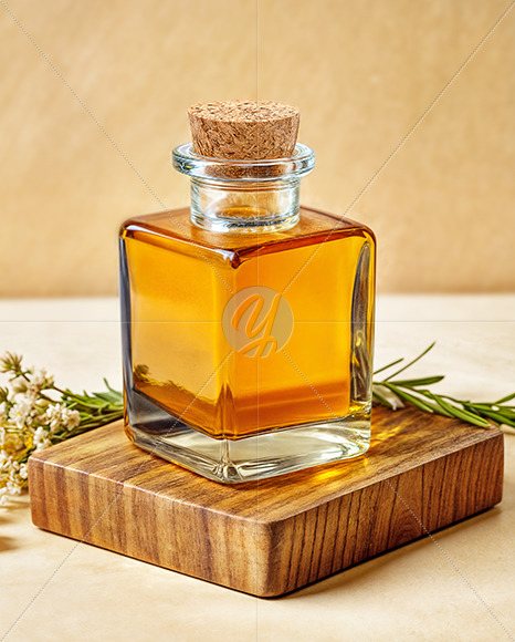 Orange Oil Tincture Square Bottle on a Wooden Board with Herbs Mockup