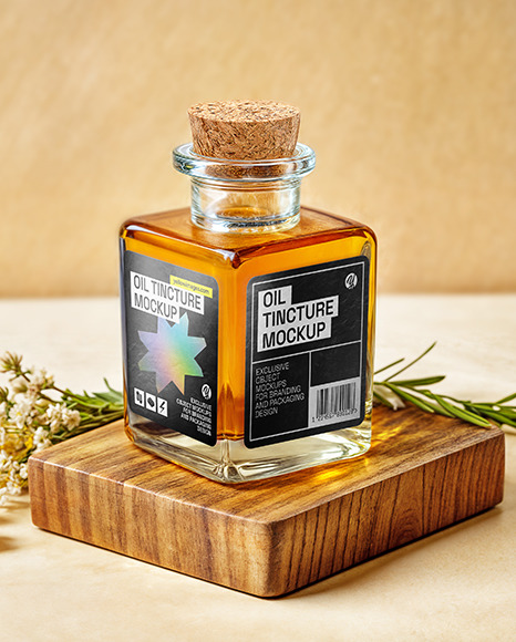 Orange Oil Tincture Square Bottle on a Wooden Board with Herbs Mockup