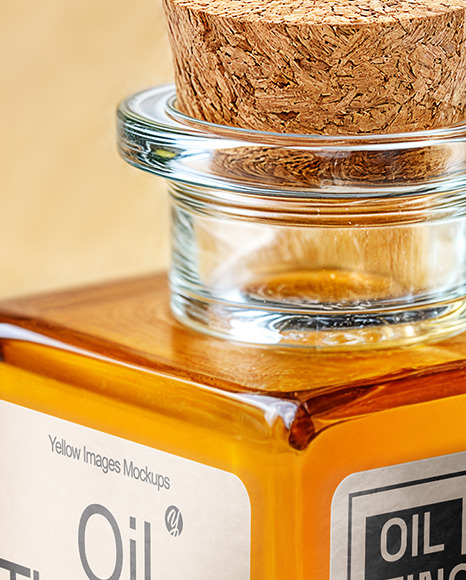 Orange Oil Tincture Square Bottle on a Wooden Board with Herbs Mockup