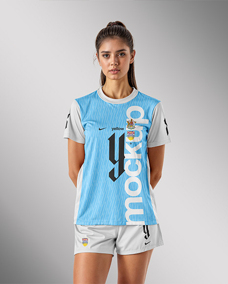 Young Woman Wearing Crew Neck Soccer Jersey and Shorts Mockup