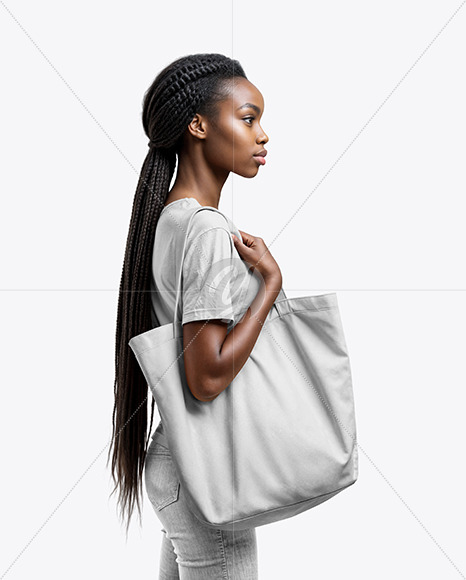 Black Woman with Tote Bag Wearing a T-shirt and Jeans Mockup