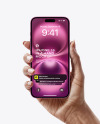 iPhone 16 Pink in a Hand Mockup