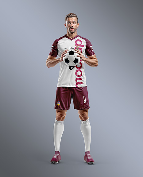 Soccer Player with Ball Wearing a Full Kit Mockup