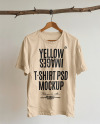 T-Shirt with Wooden Hanger Hanging on a Tree Branch Mockup