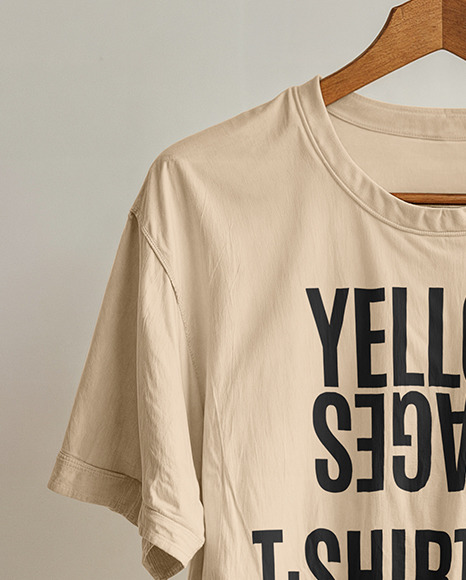 T-Shirt with Wooden Hanger Hanging on a Tree Branch Mockup