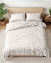 Double Bed with Bedding Set and Carpet Mockup