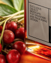 Ruby Oil Tincture Square Bottle with Berries and Flowers Mockup