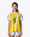 Young Woman Wearing Raglan Soccer Jersey and Shorts Mockup