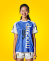 Young Woman Wearing Raglan Soccer Jersey and Shorts Mockup