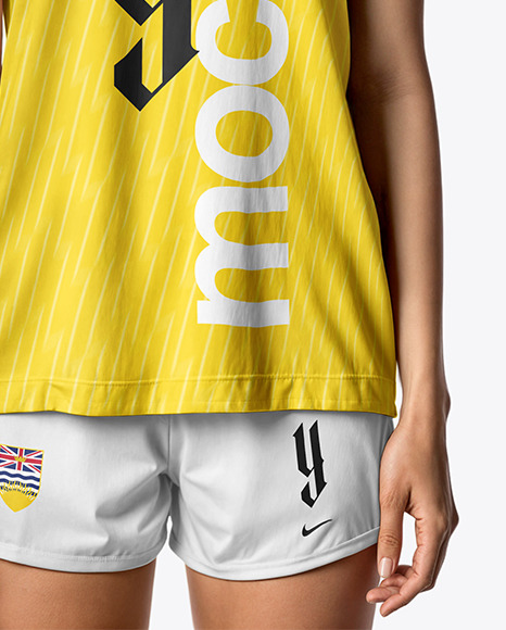 Young Woman Wearing Raglan Soccer Jersey and Shorts Mockup