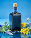 Dark Blue Oil Tincture Square Bottle with Flowers and Blue Backdrop Mockup