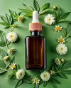 Amber Oil Tincture Square Bottle with Flowers and Green Backdrop Mockup