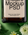 Amber Oil Tincture Square Bottle with Flowers and Green Backdrop Mockup