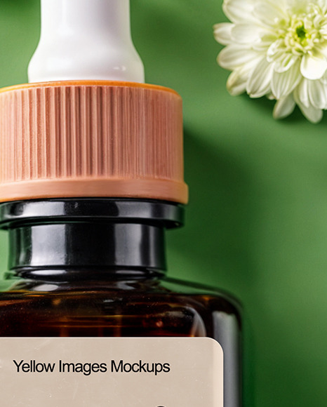 Amber Oil Tincture Square Bottle with Flowers and Green Backdrop Mockup