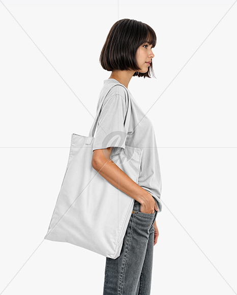 Young Woman with Tote Bag Wearing a T-Shirt and Jeans Mockup