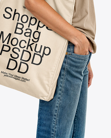 Young Woman with Tote Bag Wearing a T-Shirt and Jeans Mockup