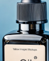 Dark Amber Oil Tincture Square Bottle on a Marble Surface with Flowers Mockup