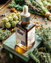 Amber Oil Tincture Square Bottle with Dry Herbs Mockup